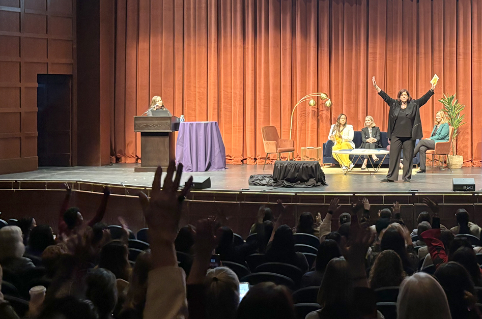 Allison speaking at EBWC in front of a live audience